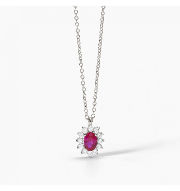 Gargantilla de plata 925 rodiada con cadena forzatina de 1,
5 mm, rubí sintético talla ovalada de 5x7 mm y circonitas blancas 2 mm, largo regulable de 40 a 45 cm